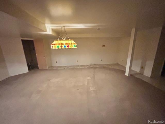 6880 Burtonwood Dr, West Bloomfield, MI 48322 - unfurnished dining area with concrete flooring