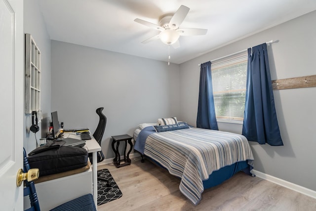 11815 Waldron Rd, Jerome, MI 49249 - bedroom featuring light wood-type flooring, baseboards, and ceiling fan