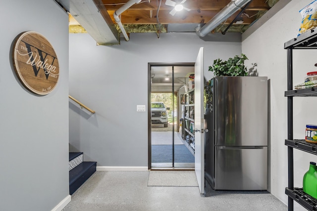 11815 Waldron Rd, Jerome, MI 49249 - doorway to outside with stairs, baseboards, and speckled floor