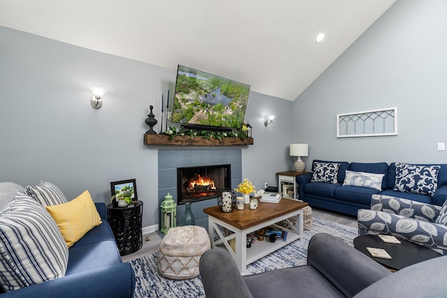 11815 Waldron Rd, Jerome, MI 49249 - living room with a fireplace, lofted ceiling, and recessed lighting