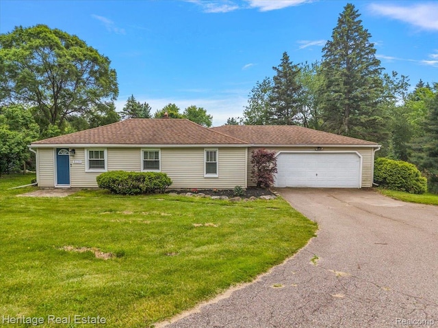 5125 Clarkston Rd, Clarkston, MI 48348 - ranch-style home with driveway, an attached garage, and a front lawn