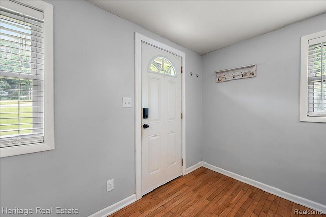 5125 Clarkston Rd, Clarkston, MI 48348 - entrance foyer with wood-type flooring and baseboards
