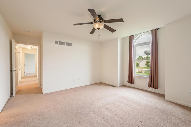 6837 Wellington Dr, Dexter, MI 48130 - empty room with carpet flooring, a ceiling fan, and baseboards