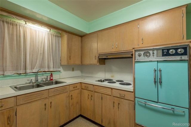 2812 Berkley St, Flint, MI 48504 - kitchen featuring white electric cooktop, under cabinet range hood, light countertops, and a warming drawer