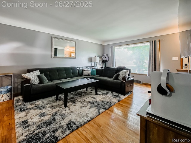 13973 Dixie, Redford, MI 48239 - living area featuring wood finished floors