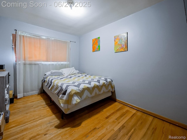 13973 Dixie, Redford, MI 48239 - bedroom with light wood-style flooring and baseboards