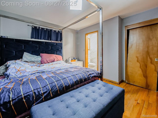 13973 Dixie, Redford, MI 48239 - bedroom featuring wood-type flooring and ensuite bathroom