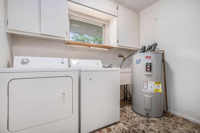 1205 Sassafras Ln, Niles, MI 49120 - laundry room with electric water heater, cabinet space, washing machine and clothes dryer, and baseboards