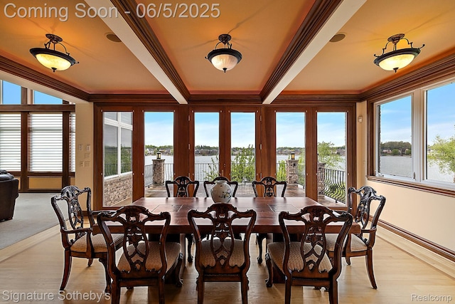 10611 Lighthouse Pt, South Lyon, MI 48178 - dining area with ornamental molding, a water view, french doors, baseboards, and light wood-type flooring