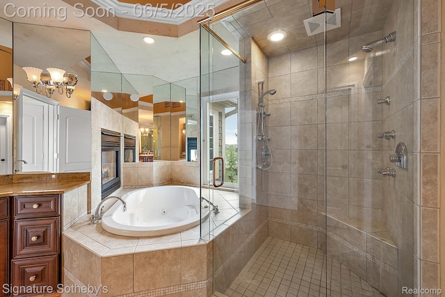 10611 Lighthouse Pt, South Lyon, MI 48178 - full bathroom featuring a shower stall, a jetted tub, vanity, a tile fireplace, and a chandelier