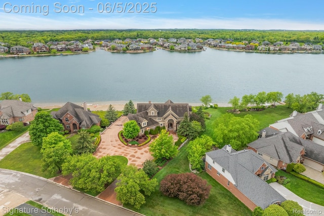10611 Lighthouse Pt, South Lyon, MI 48178 - aerial view of residential area with a large body of water