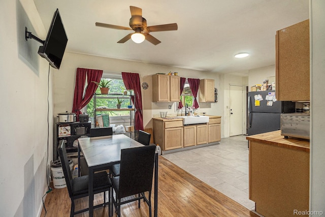 7184 Grand River Rd, Bancroft, MI 48414 - dining space featuring a ceiling fan