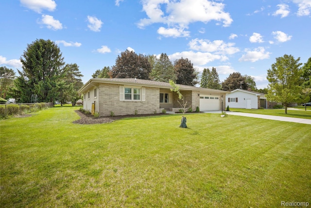 116 Surrey Rd, Saint Louis, MI 48880 - single story home with concrete driveway, a garage, and brick siding