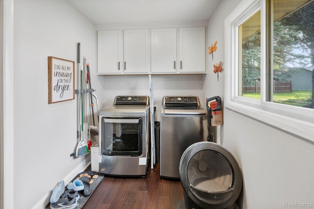116 Surrey Rd, Saint Louis, MI 48880 - laundry room with washing machine and dryer, dark wood-style flooring, cabinet space, and baseboards