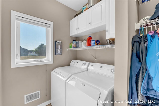 4052 Quest Ct SW, Wyoming, MI 49418 - laundry area with independent washer and dryer and cabinet space