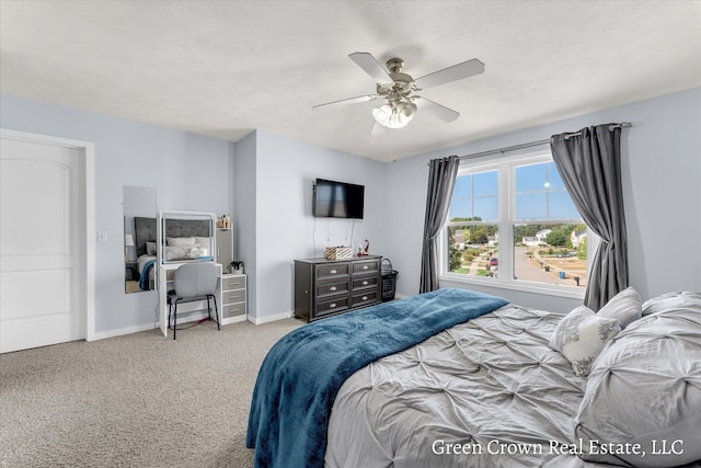 4052 Quest Ct SW, Wyoming, MI 49418 - carpeted bedroom with baseboards and a ceiling fan