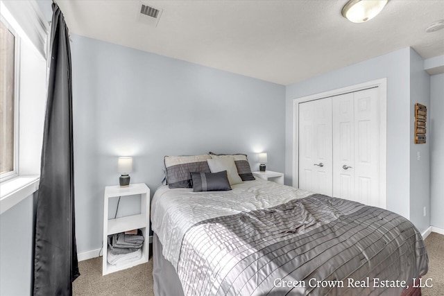 4052 Quest Ct SW, Wyoming, MI 49418 - bedroom featuring carpet flooring, baseboards, and a closet