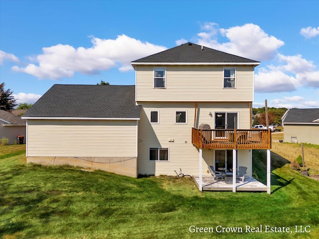 4052 Quest Ct SW, Wyoming, MI 49418 - rear view of house with a wooden deck, a yard, and a patio