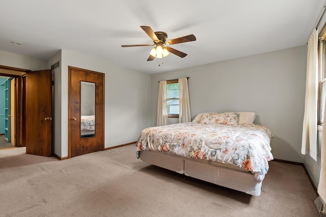4564 Sparrow Ave, Kalamazoo, MI 49004 - carpeted bedroom with baseboards and a ceiling fan