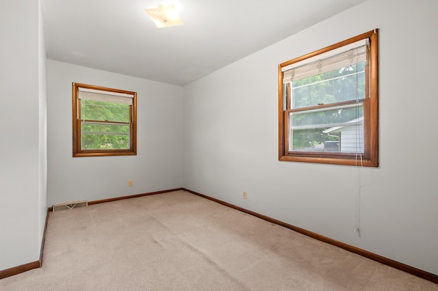 4564 Sparrow Ave, Kalamazoo, MI 49004 - unfurnished room with light colored carpet and baseboards