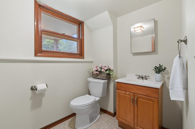 4564 Sparrow Ave, Kalamazoo, MI 49004 - bathroom featuring toilet, vanity, and baseboards