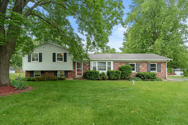 4564 Sparrow Ave, Kalamazoo, MI 49004 - split level home with brick siding and a front lawn