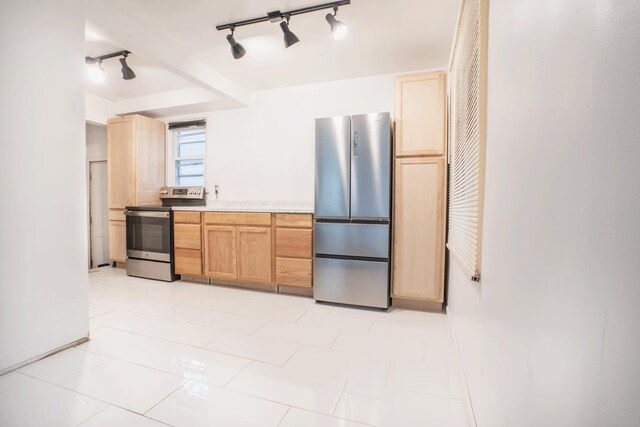 18350 Codding St, Detroit, MI 48219 - kitchen with stainless steel appliances, rail lighting, light countertops, light brown cabinets, and baseboards