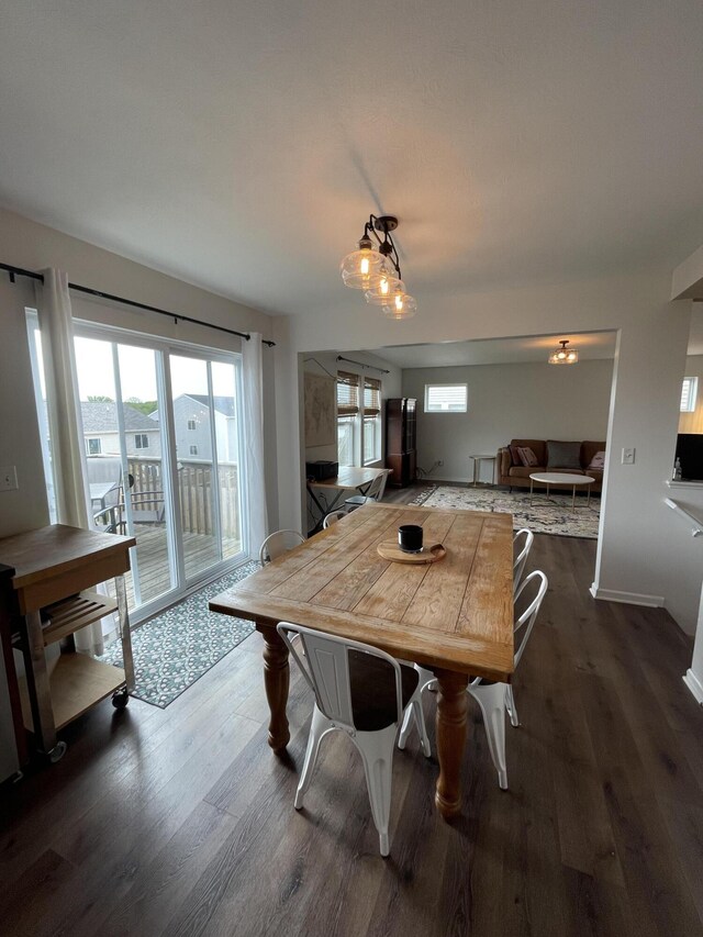 8808 Geiser Grv, Richland, MI 49083 - dining space with plenty of natural light and dark wood-style floors