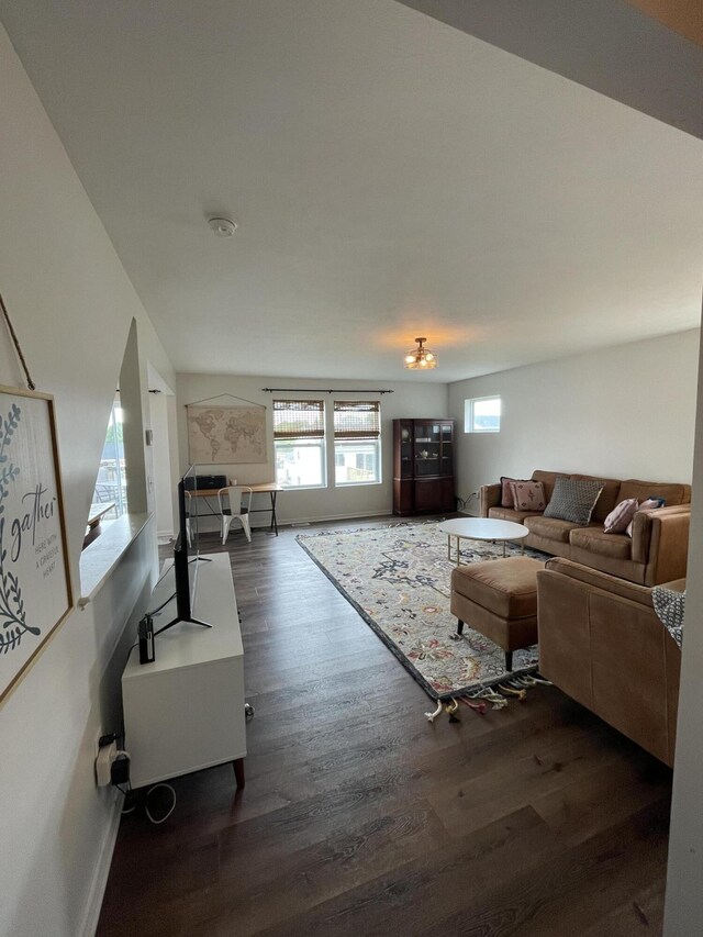 8808 Geiser Grv, Richland, MI 49083 - living room with dark wood-style flooring and baseboards