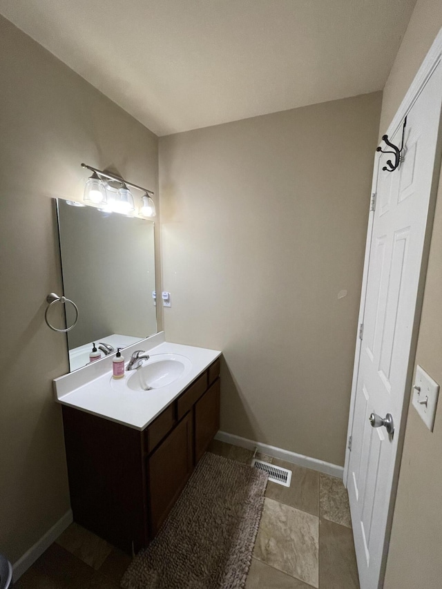 8808 Geiser Grv, Richland, MI 49083 - bathroom featuring vanity and baseboards