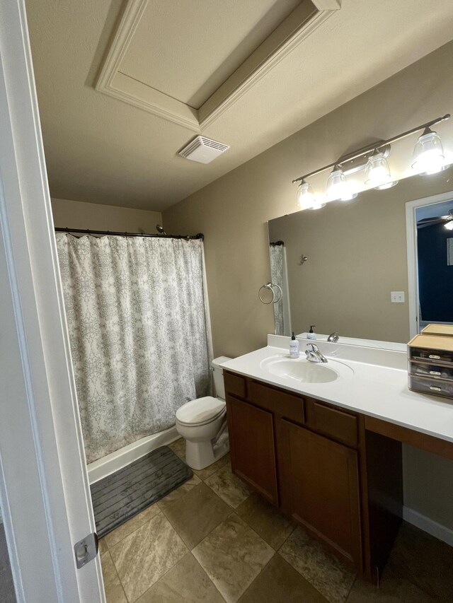 8808 Geiser Grv, Richland, MI 49083 - bathroom featuring vanity, toilet, and curtained shower