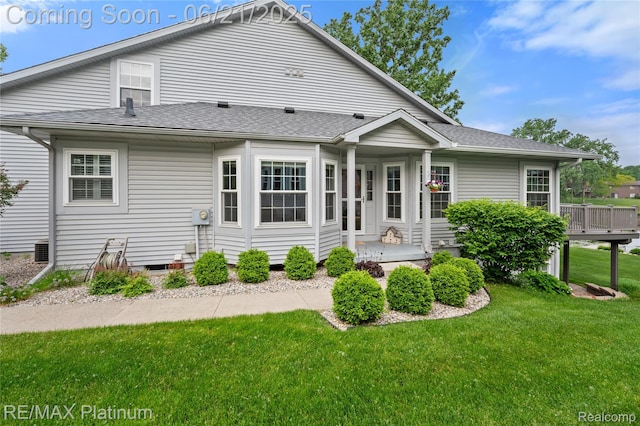 2336 Swans Cv Unit 7, Fenton, MI 48430 - view of front facade with a front lawn and a shingled roof