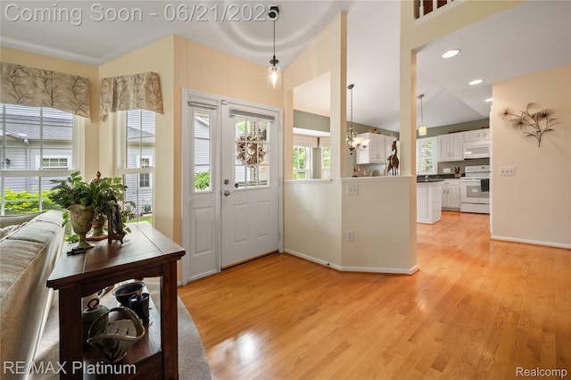 2336 Swans Cv Unit 7, Fenton, MI 48430 - foyer with light wood-type flooring and baseboards
