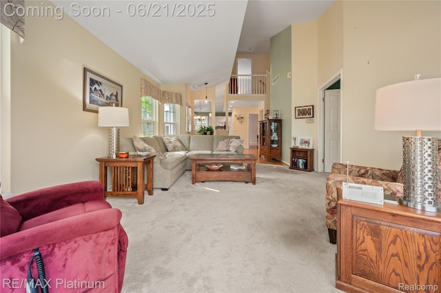 2336 Swans Cv Unit 7, Fenton, MI 48430 - living area featuring carpet flooring and a high ceiling