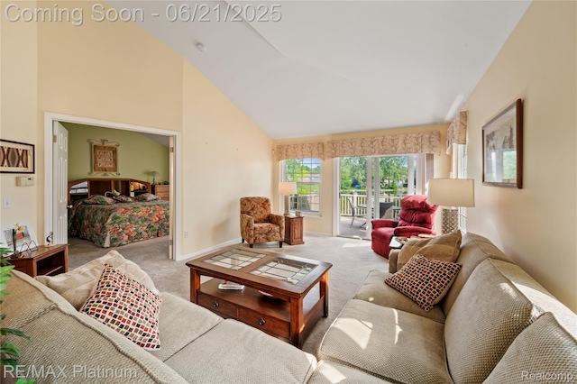 2336 Swans Cv Unit 7, Fenton, MI 48430 - carpeted living area with high vaulted ceiling and baseboards