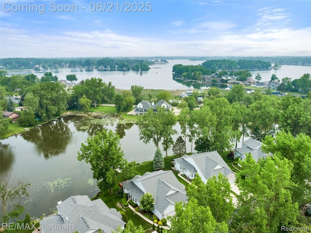 2336 Swans Cv Unit 7, Fenton, MI 48430 - aerial view of residential area with a large body of water