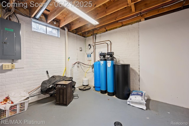 2336 Swans Cv Unit 7, Fenton, MI 48430 - basement featuring electric panel and a water softener