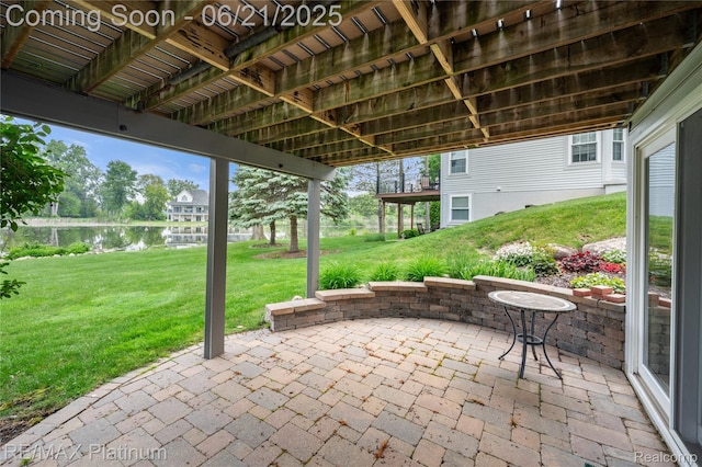 2336 Swans Cv Unit 7, Fenton, MI 48430 - view of patio featuring a water view