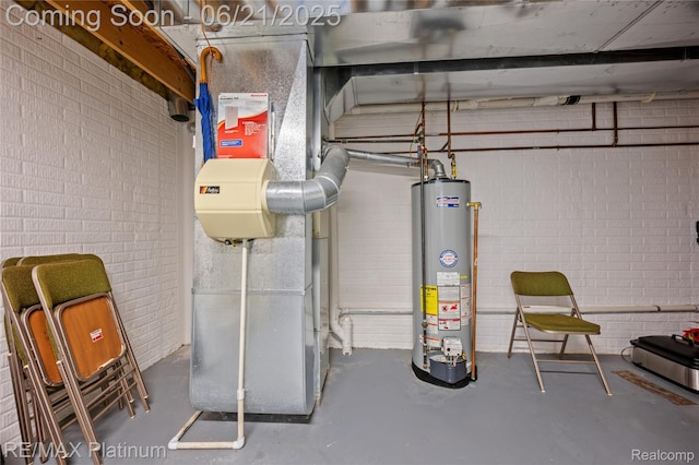 2336 Swans Cv Unit 7, Fenton, MI 48430 - utility room featuring gas water heater