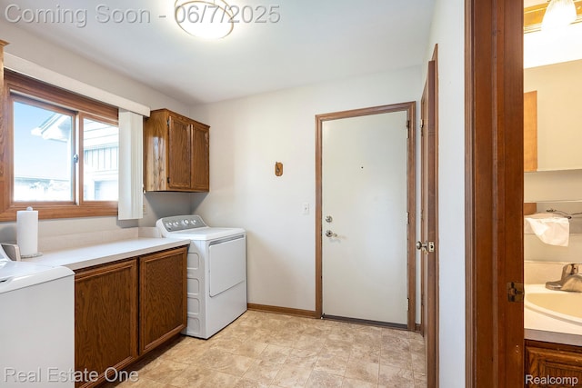 16256 Karen Dr, Clinton Township, MI 48038 - washroom featuring cabinet space, washer and dryer, and baseboards