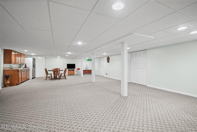 2391 Atwell Rd, Attica, MI 48412 - finished below grade area featuring freestanding refrigerator, light colored carpet, recessed lighting, a paneled ceiling, and baseboards