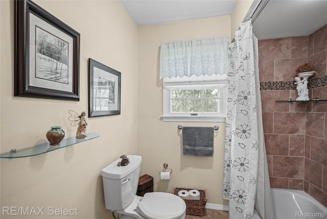 2391 Atwell Rd, Attica, MI 48412 - bathroom featuring toilet, shower / bath combo, tile patterned flooring, and baseboards