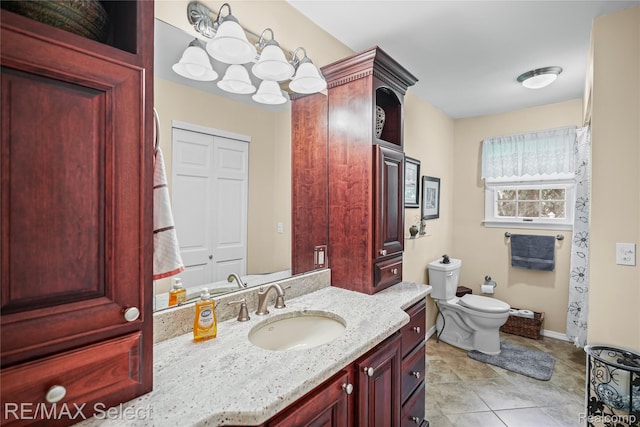 2391 Atwell Rd, Attica, MI 48412 - bathroom with toilet, vanity, baseboards, and tile patterned flooring