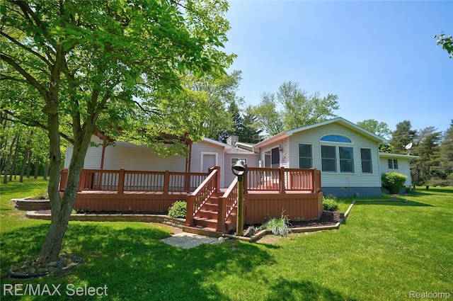 2391 Atwell Rd, Attica, MI 48412 - back of house with a wooden deck, crawl space, and a yard