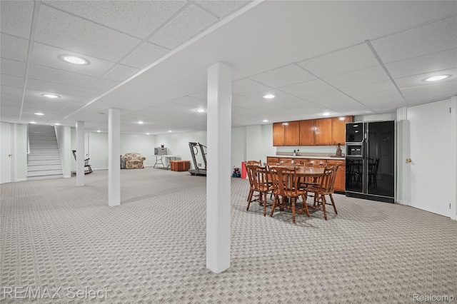 2391 Atwell Rd, Attica, MI 48412 - dining space featuring light colored carpet, a drop ceiling, stairs, bar, and recessed lighting