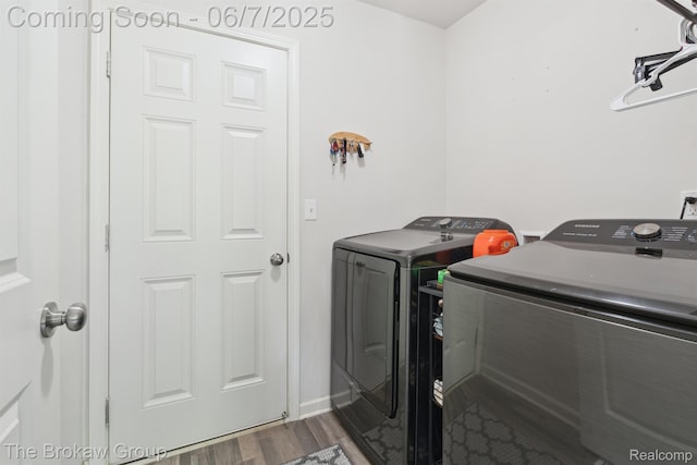 9211 Hawthorn Dr, Davison, MI 48423 - laundry room with separate washer and dryer and dark wood finished floors