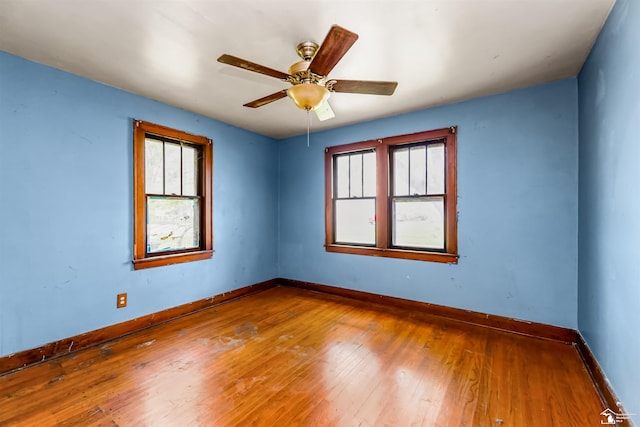 5650 Sylvia St, Dearborn Heights, MI 48125 - spare room with hardwood / wood-style floors and a ceiling fan