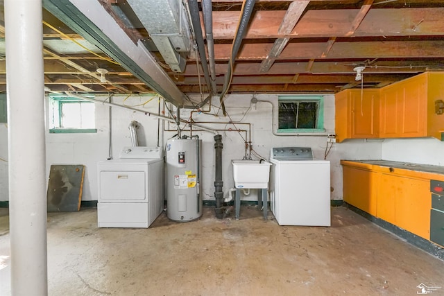 5650 Sylvia St, Dearborn Heights, MI 48125 - basement featuring water heater and independent washer and dryer