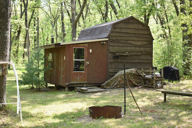 2186 88th St, Bitely, MI 49309 - view of shed with a wooded view