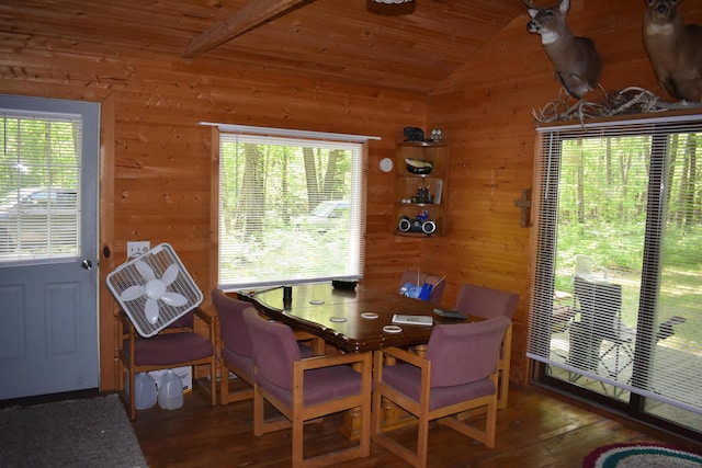2186 88th St, Bitely, MI 49309 - dining area with plenty of natural light, wood walls, vaulted ceiling, wood finished floors, and wood ceiling